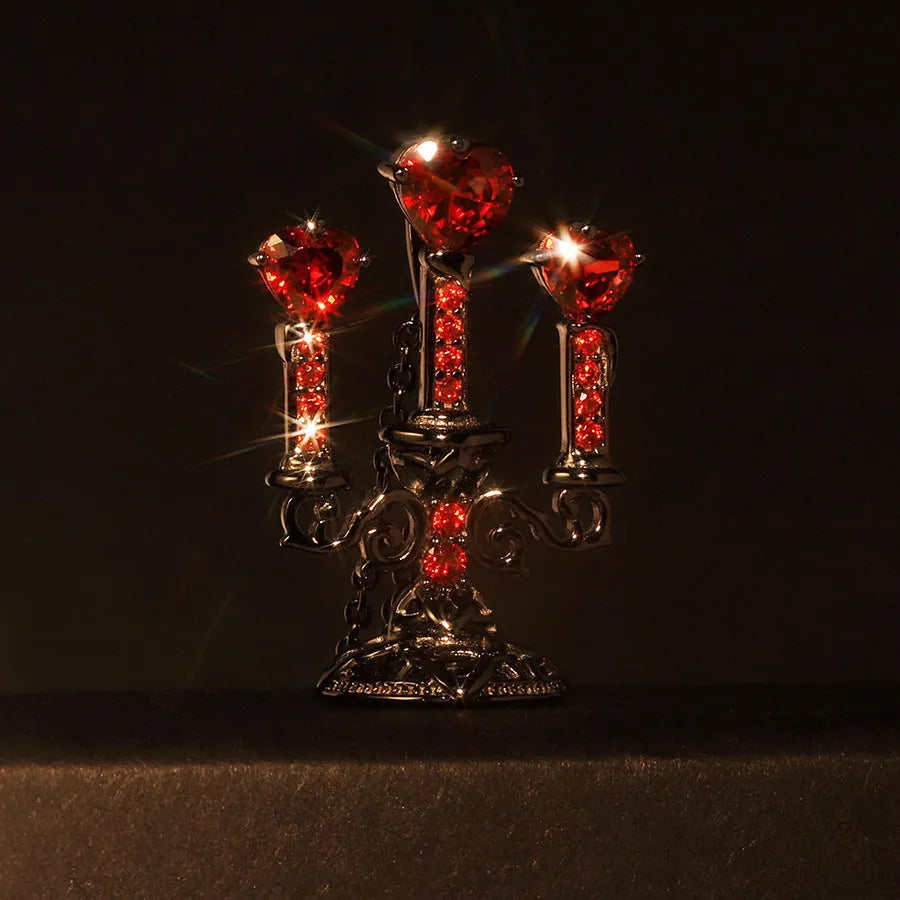 Gothic hollow candlestick pendant necklace on a cross chain in retro candlestick colour.