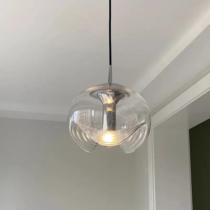 Modern glass chandelier with minimalist design showing transparent, amber and smoky grey light colour options