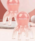 Pink natural resin octopus massage comb for periocular meridian stimulation with storage bag