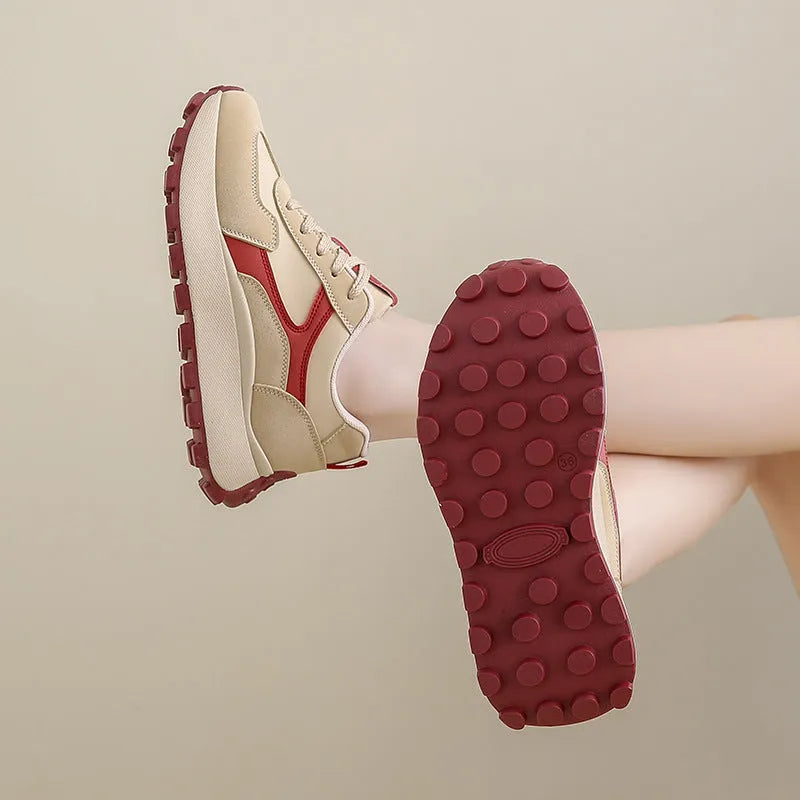 Women's casual platform sport shoes in solid colours with flat rubber sole and lace-up front.