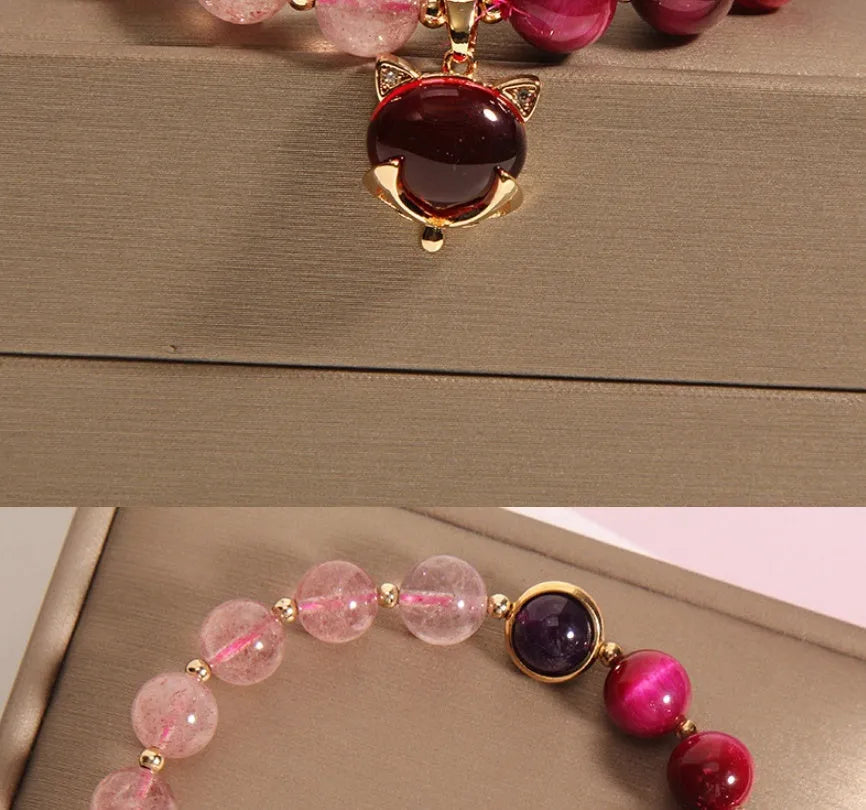 Women's strawberry crystal bracelet with elastic rope showing uniform 18cm size and simple design