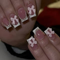 Short white French press-on nails with bow and tulip designs in European square shape