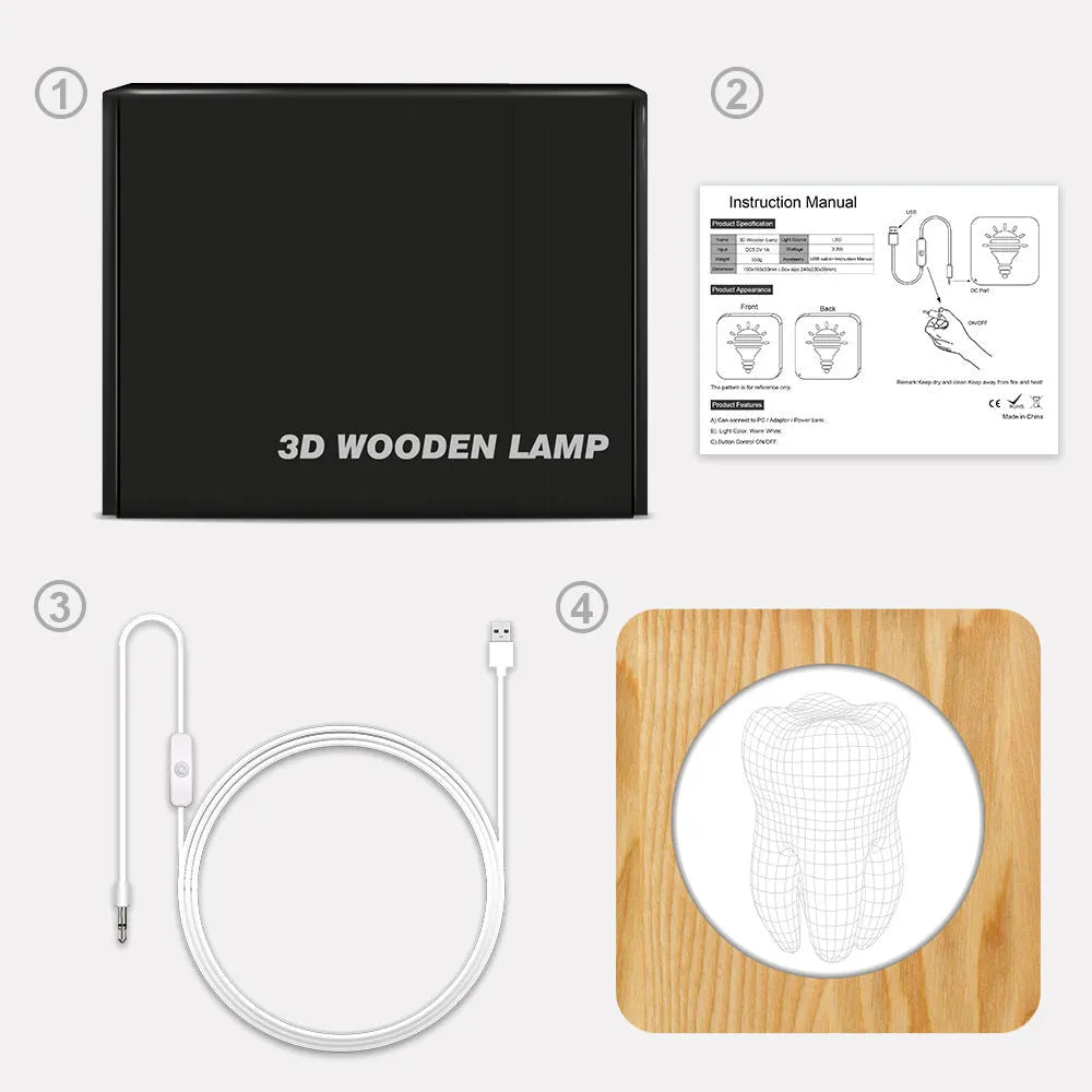 Wood-coloured tooth-shaped acrylic night lamp with USB cable on a surface.