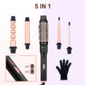 All-in-one three-barrel water wave hair curler and straightener with power cord.