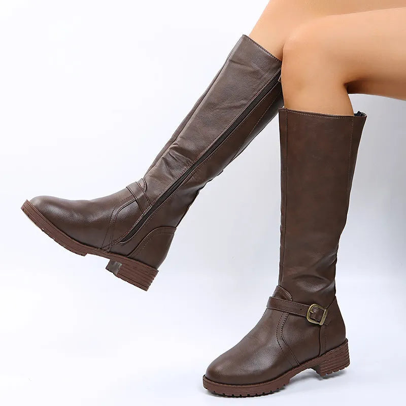 Yellow women's high knight boots with a square heel, round toe, and side buckle detail.