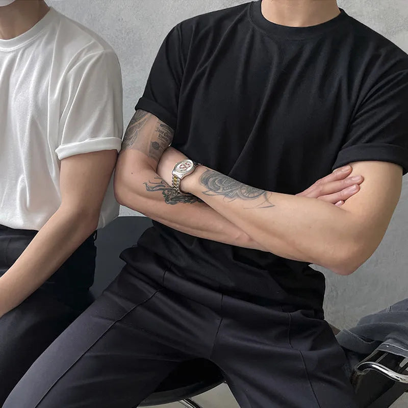 Men's slim-fit cotton t-shirt in white and black, showing round neck and half sleeves.