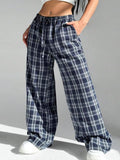 Women's casual plaid trousers with drawstring waist and patch pockets in blue and red colour options