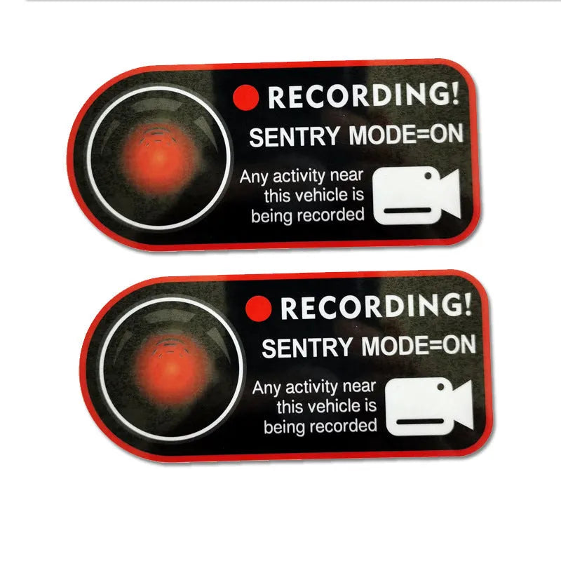 Pair of white electrostatic warning stickers for Tesla Sentry Mode, sized 11x5 cm.