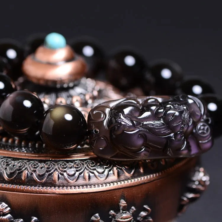 Crystal natural icy obsidian Pi Xiu bracelet with geometric ethnic design on wrist