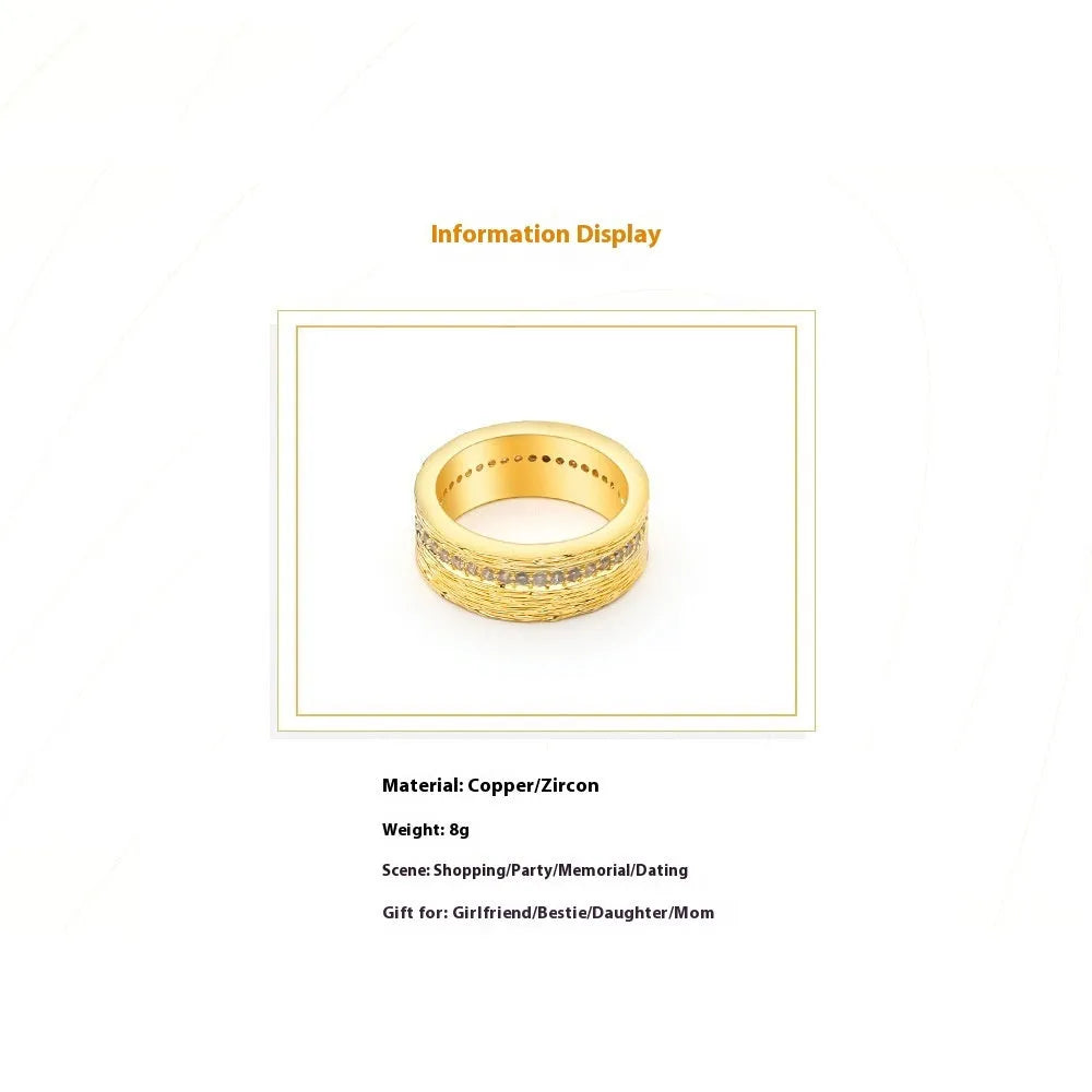 Geometric gold-coloured zircon ring for women showing detailed design and electroplated finish