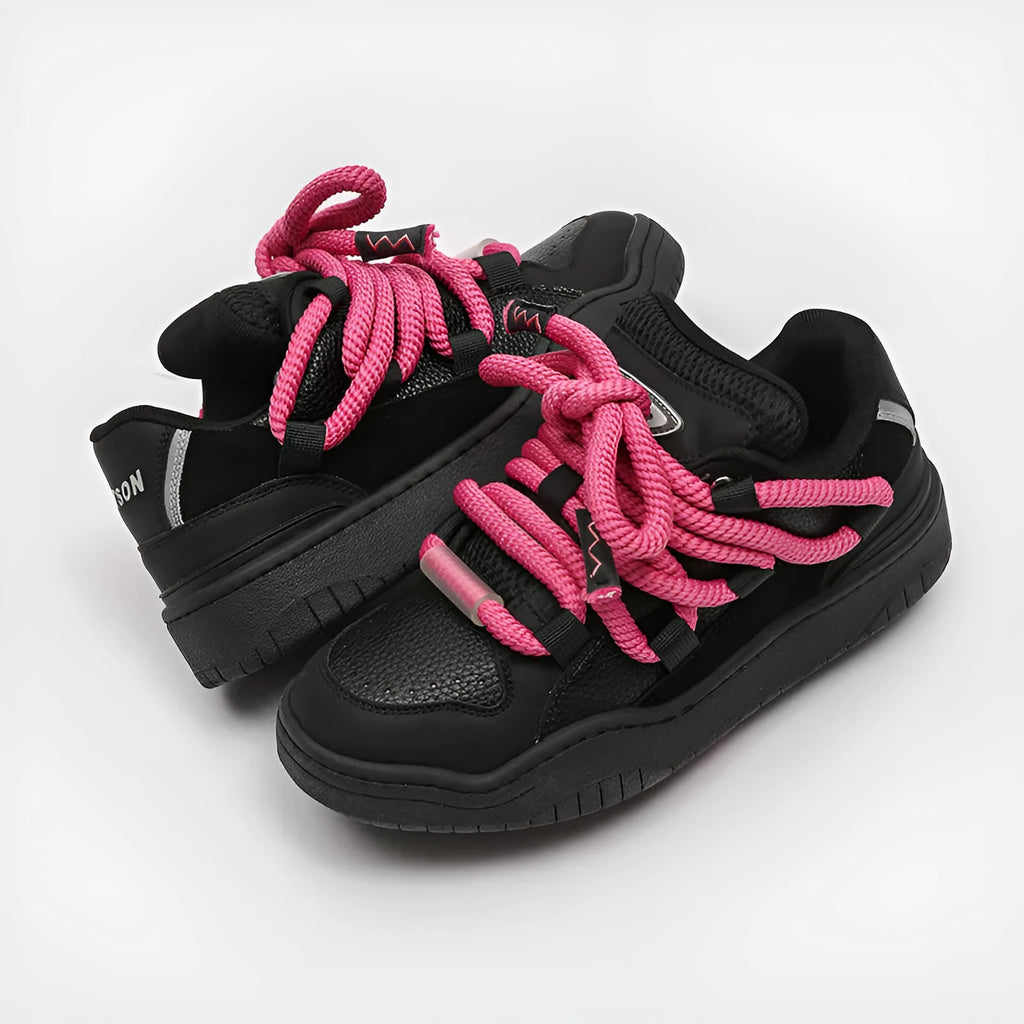 Low-top lace-up casual sneakers in denim blue with a round toe and thick rubber sole.