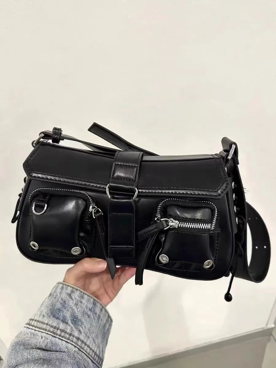 Black baguette-style women's messenger bag with a single crossbody strap