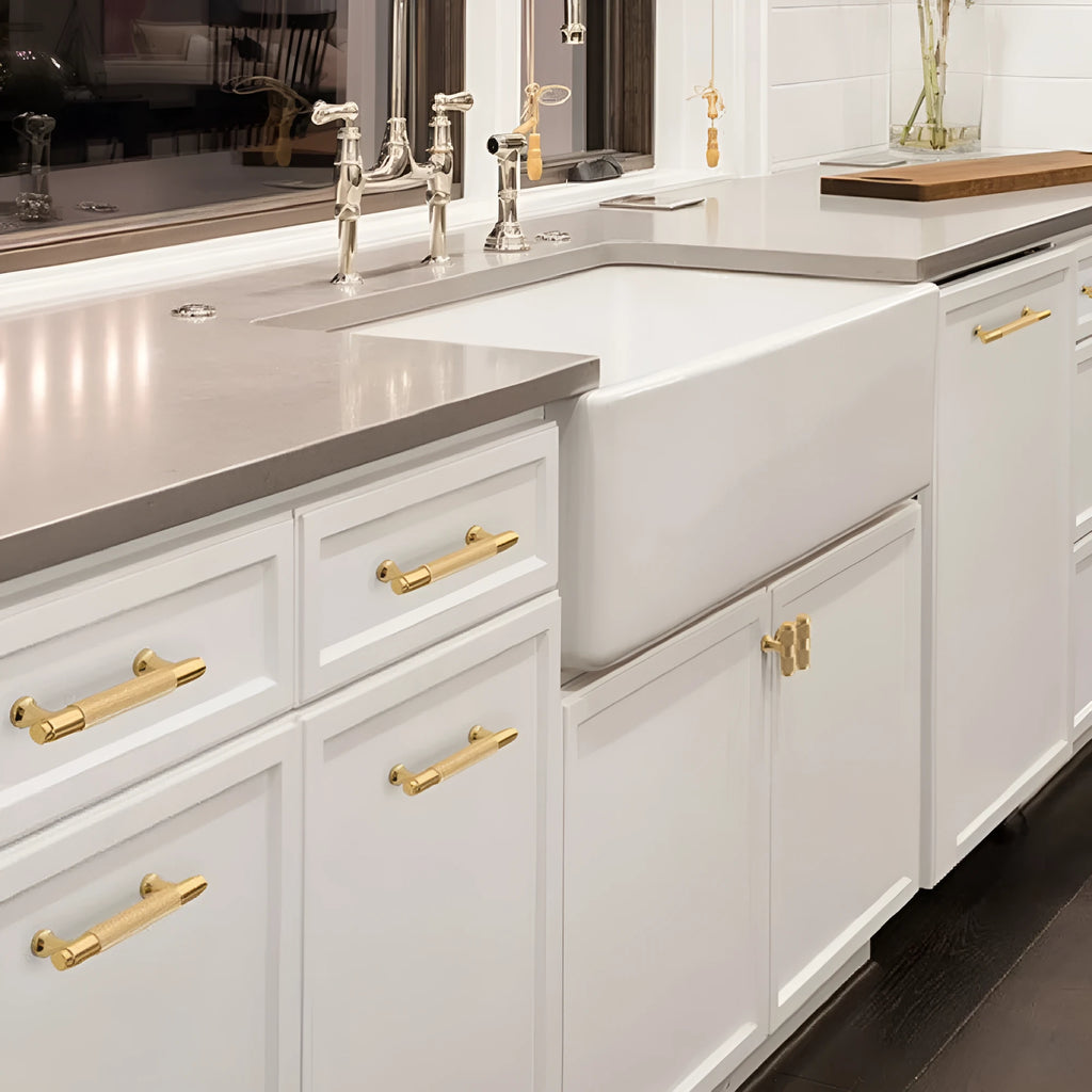 European style aluminium cabinet handle with brushed brass finish showing mounting holes