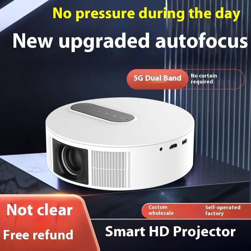 White 720p HD home theatre smart projector with remote control on a table.