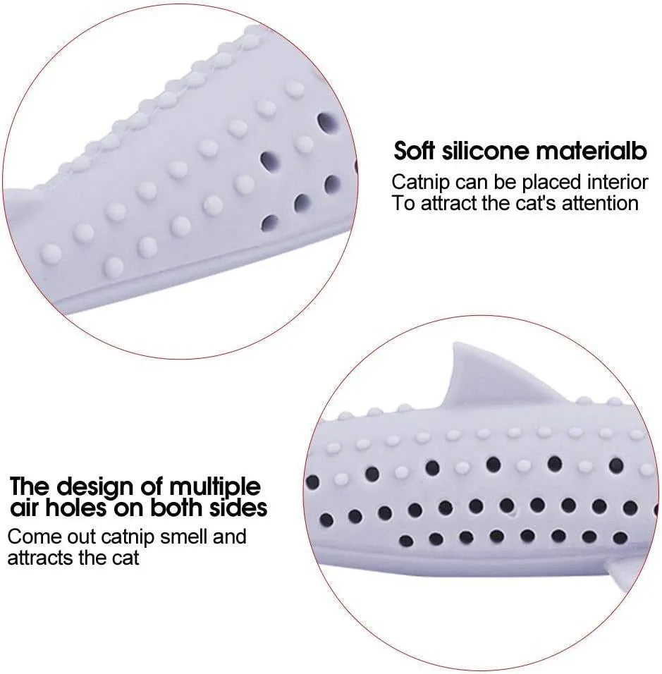 Green silicone fish-shaped chew toy for cats with breathable side holes on a white background.