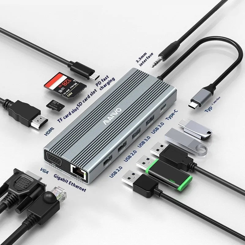 Steam Deck six-in-one aluminium docking station with HDMI, USB, and ethernet ports on a desk.