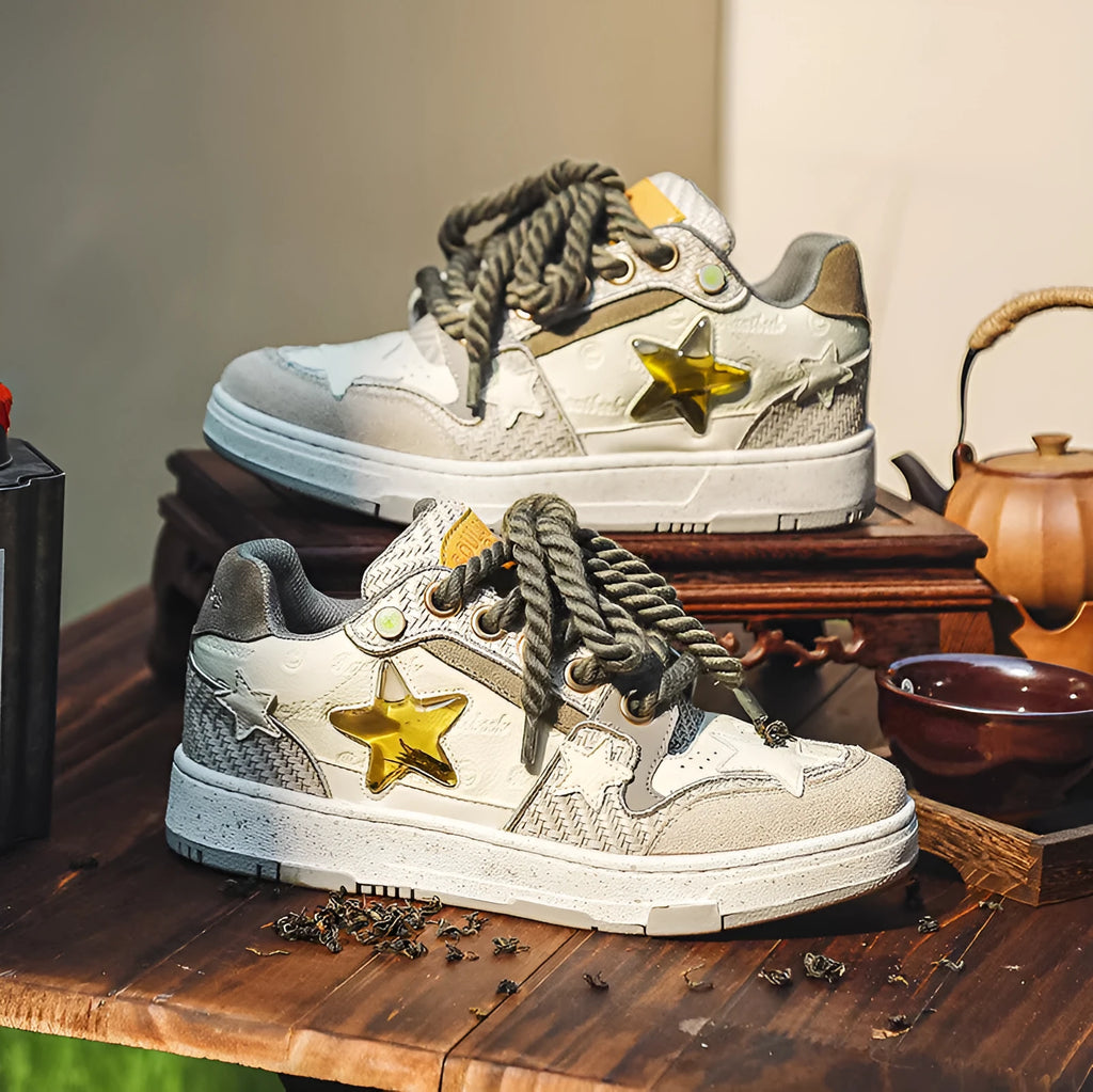 Brown leather platform running shoes with round toe and lace-up closure on white background