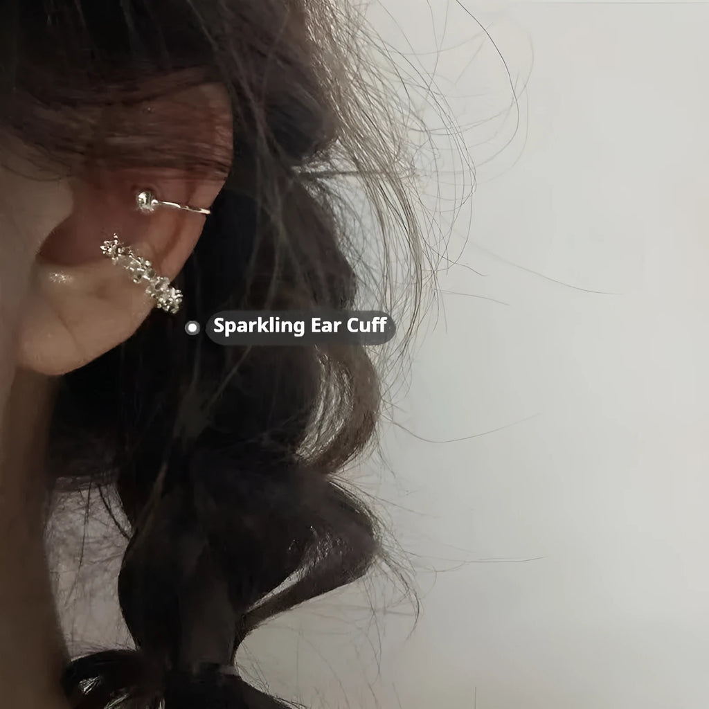 A pair of frosty B4710# coloured geometric ear clip earrings with an irregular shape.
