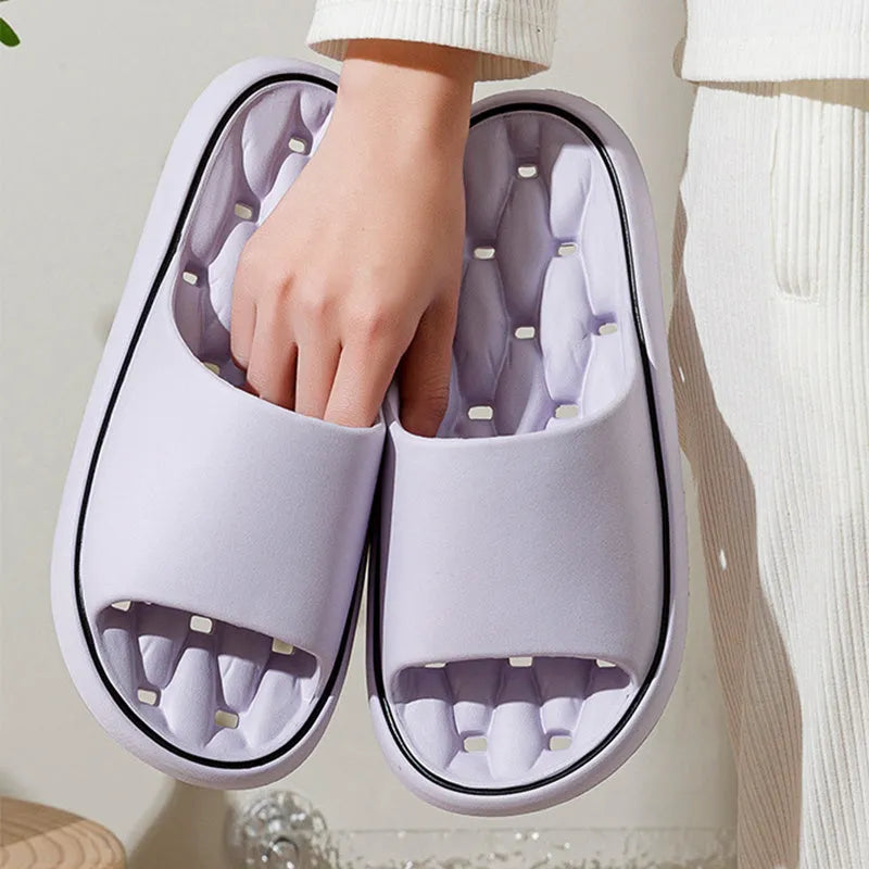 Non-slip EVA bathroom slippers with thick sole and hollow upper, available in seven colours and five sizes.