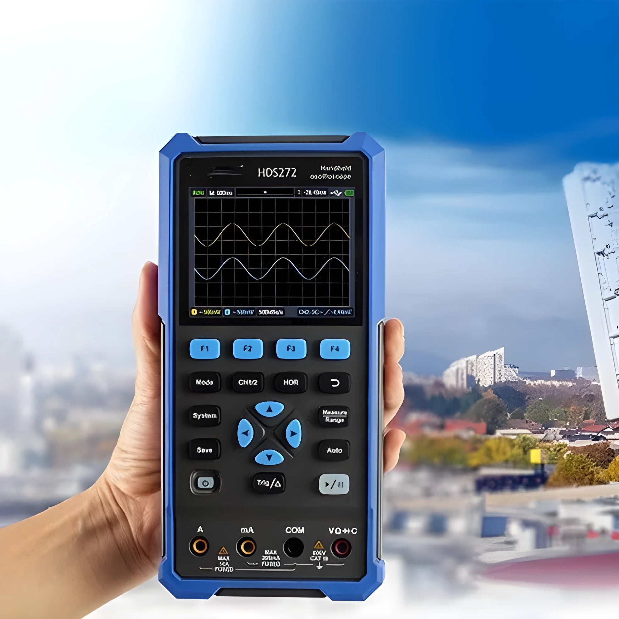Owon HDS272 handheld digital oscilloscope with screen, probes, and accessories on a grey background.