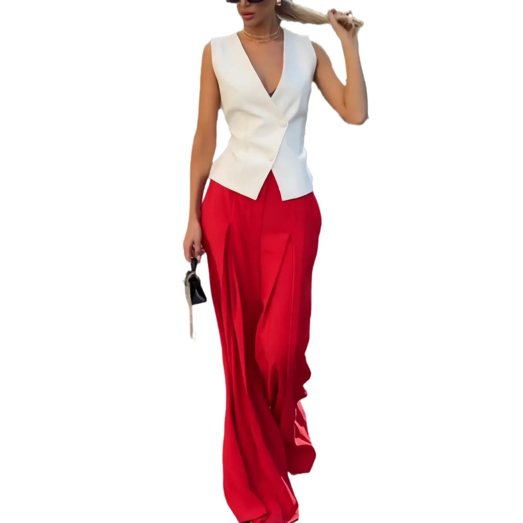 Beige women's sleeveless V-neck top and wide-leg high-waist trousers two-piece set laid flat.