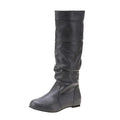Women's black flat-heel slip-on ankle boots with round toe and high shaft on a rubber sole.