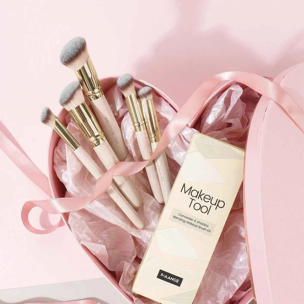 MAANGE apricot coloured 5-piece makeup brush set with angled blusher brush on a table