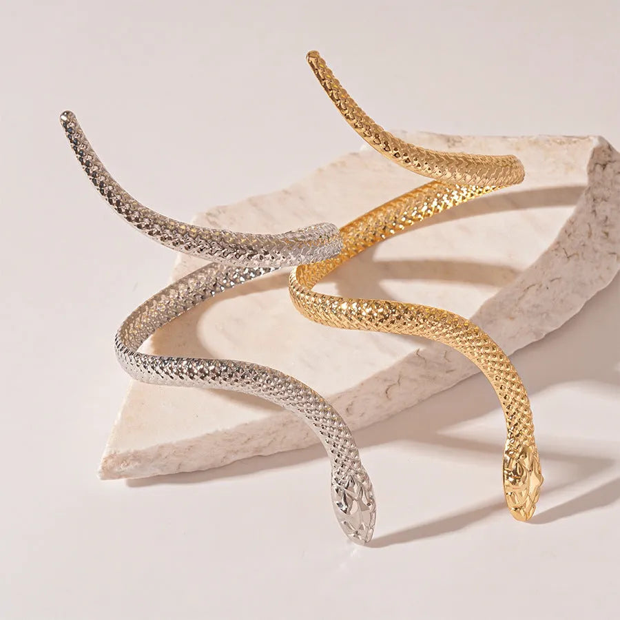 Gold and silver snake ring bracelet set with exaggerated twisted winding design