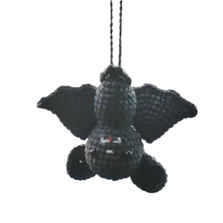 Plush hand-woven polyester car hanging ornament showing a cartoon character design.