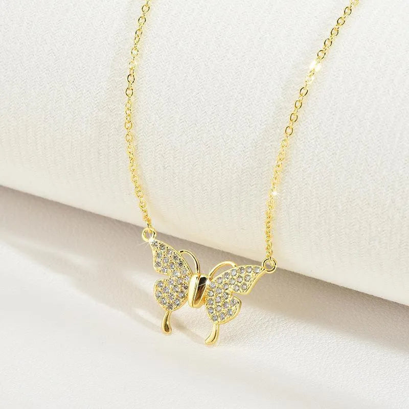 Women's magnetic fastening butterfly necklace with twisted titanium steel chain in gold colour