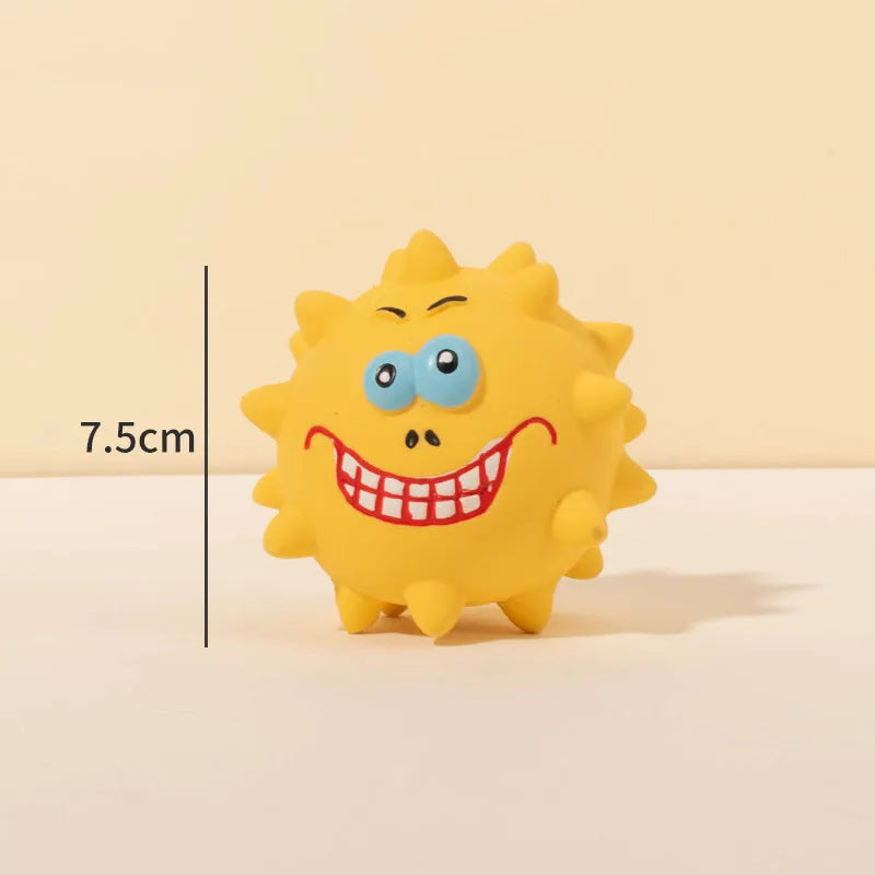 Four colourful latex squeaky dog toy balls with cute animal faces and textured surfaces