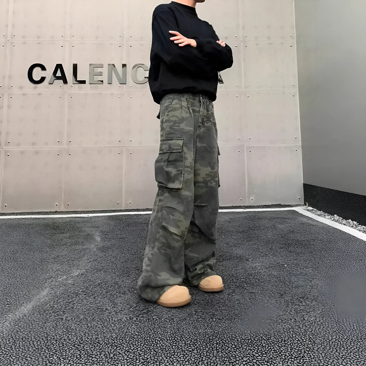 Cotton blend cargo pants with washed camouflage print and multiple pockets