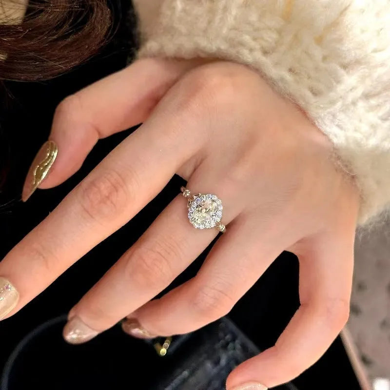 Silver geometric ellipse bridal bouquet ring with adjustable opening and diamond treatment detailing