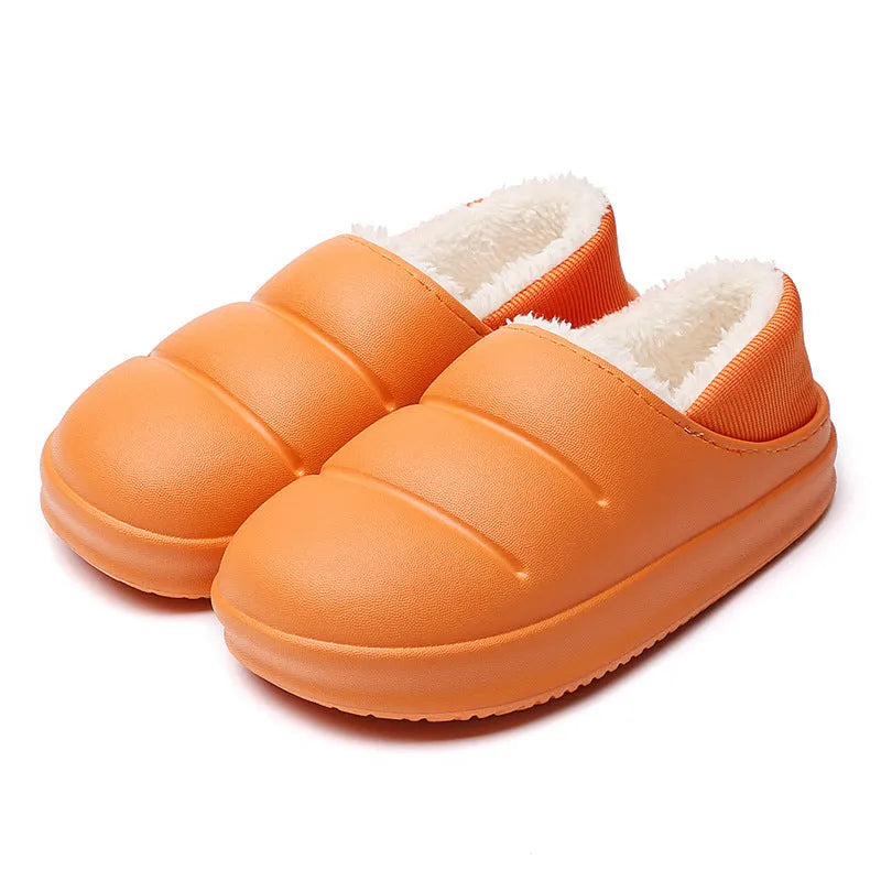 A pair of waterproof EVA couple slippers with a plush lining, shown in a choice of colours like green, pink, or grey.