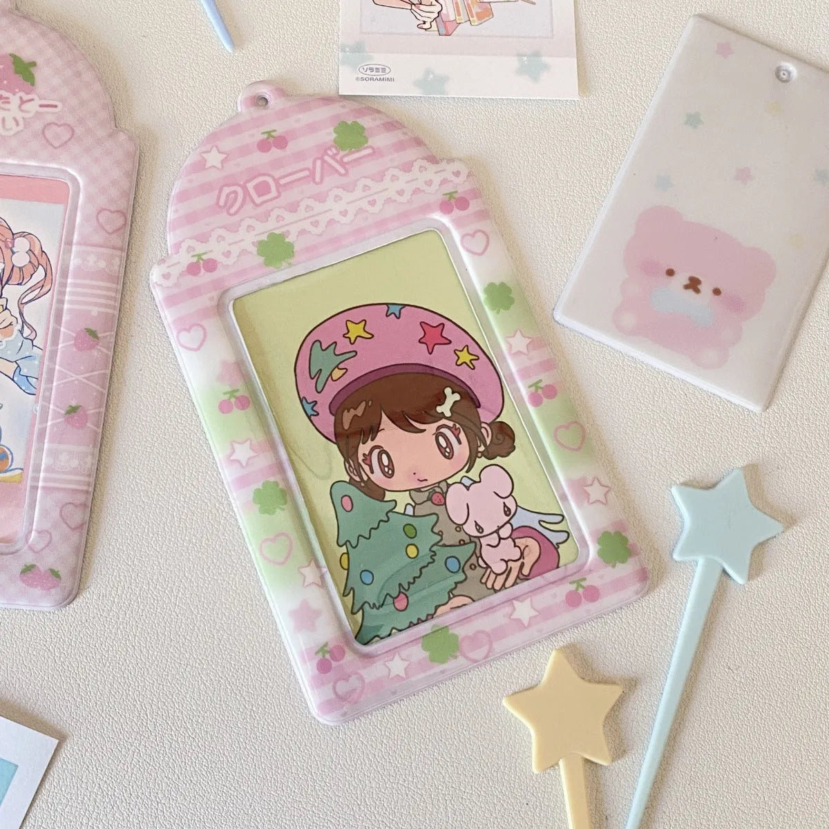 PVC plastic meal card holder pendant in strawberry and four-leaf clover cartoon designs.