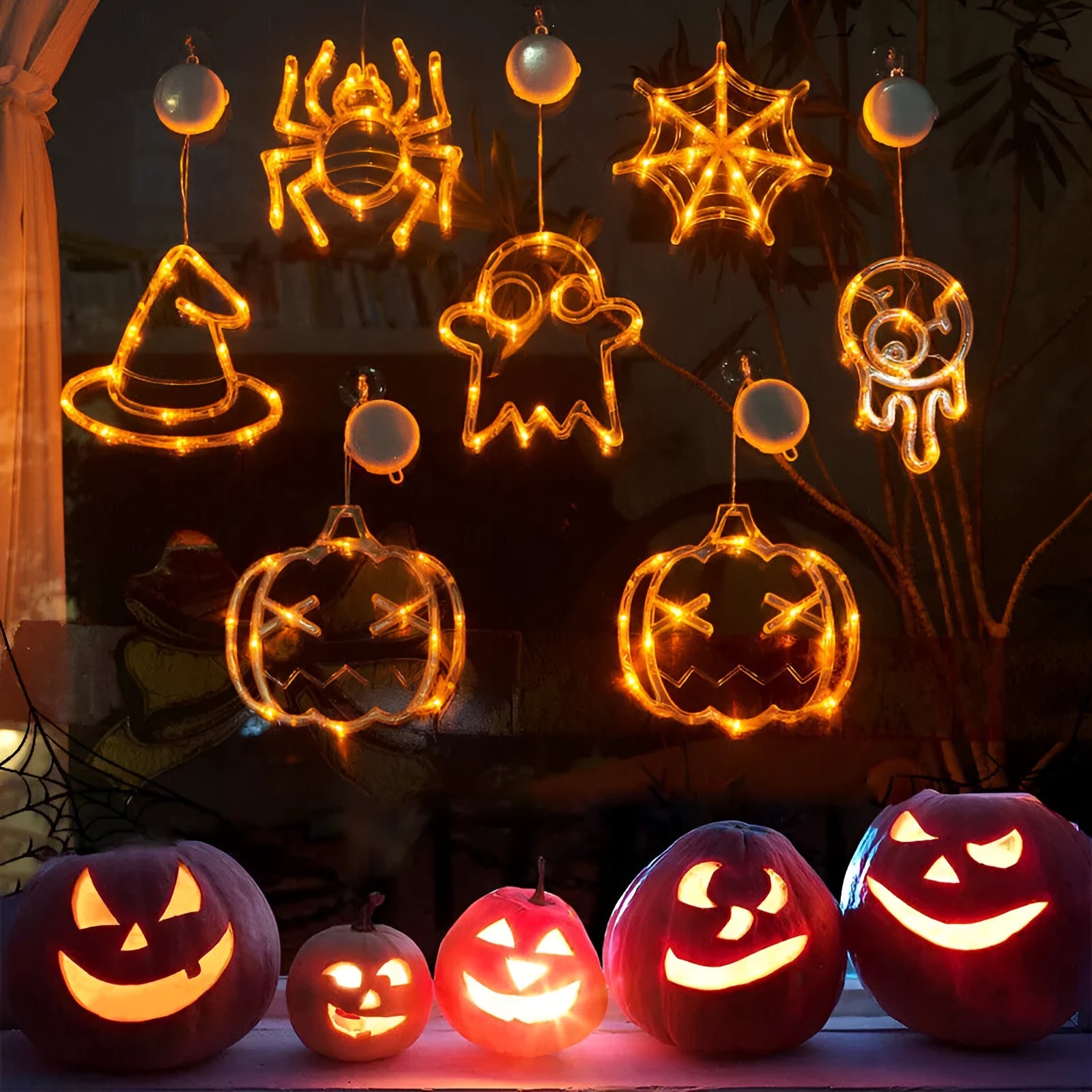 Halloween battery-powered LED window lights with suction cups showing spider, pumpkin and ghost designs