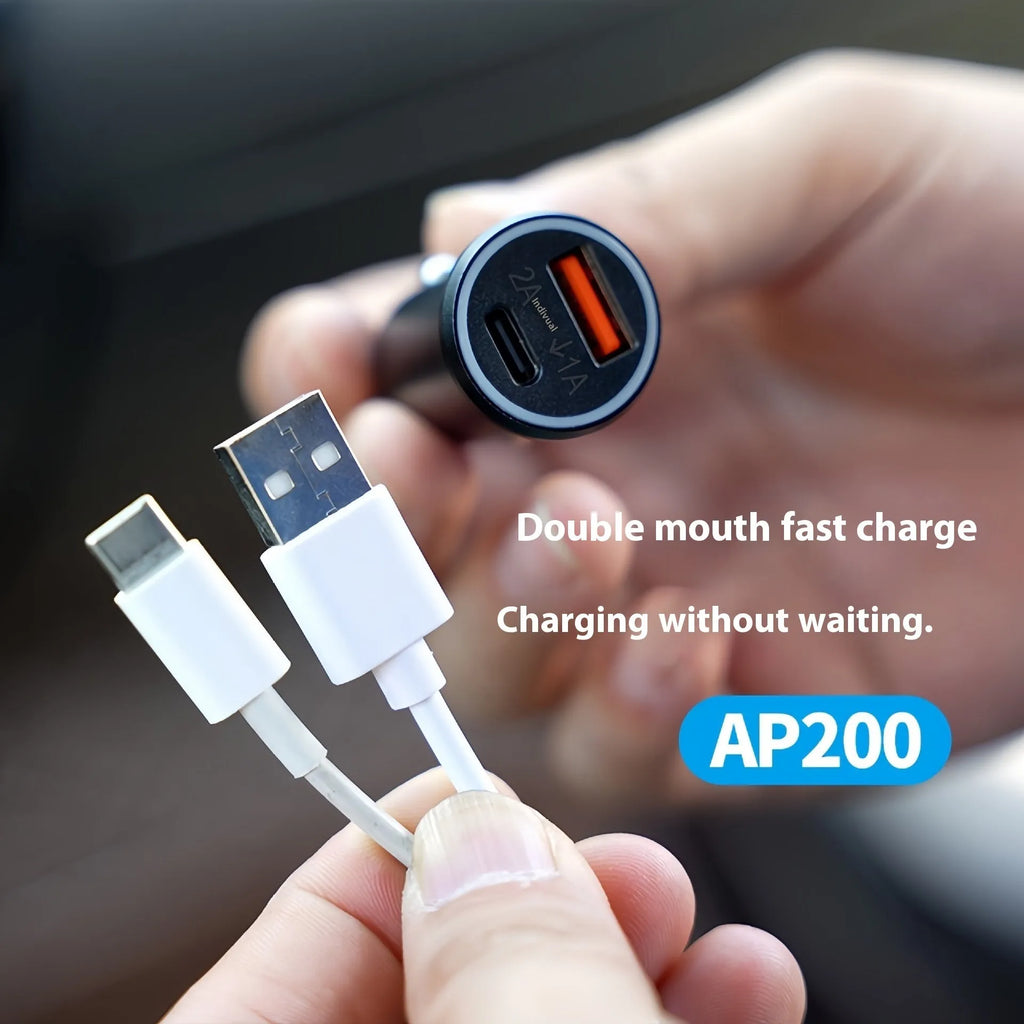 Black car charger GPS locator tracking device for vehicle security on a grey background.
