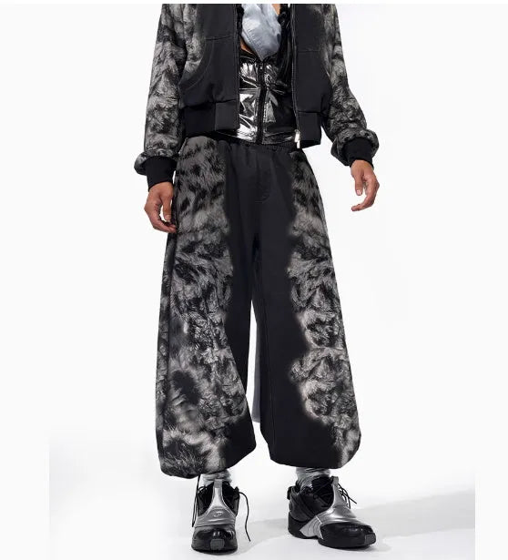 Printed loose fit trouser set including trousers, hoodie, and seven-inch shorts with collage stitching details