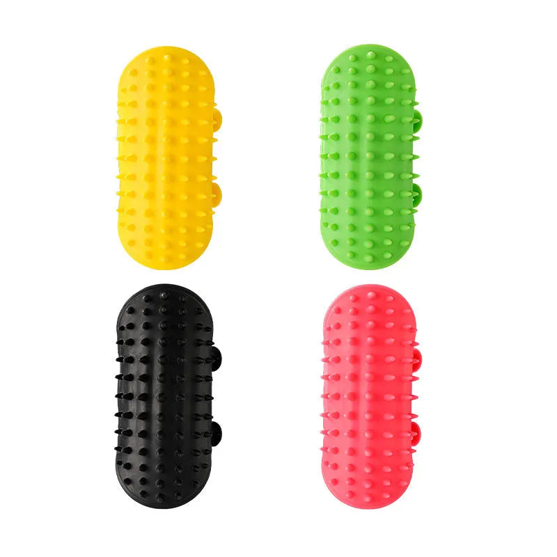 Adjustable silicone cat scratching grooming brush in black, mounted on a table leg.