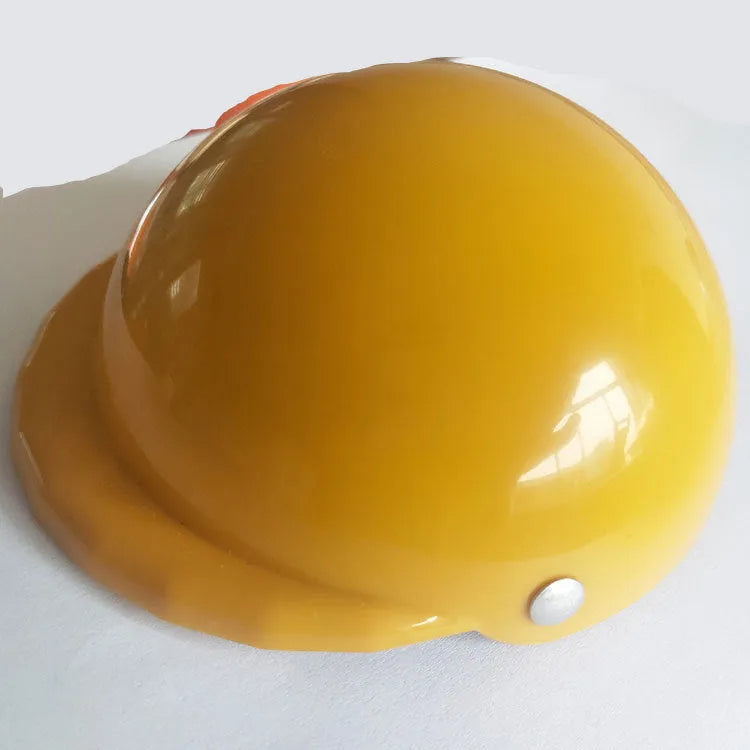 A pink plastic dog helmet cap showing its rigid shape and solid colour, sized for a small dog.