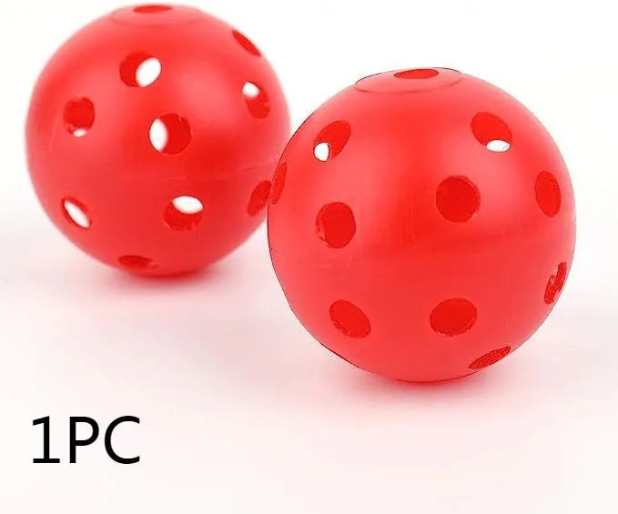 Multi-colour golf practice balls on 26-hole putting mat with net pocket packaging