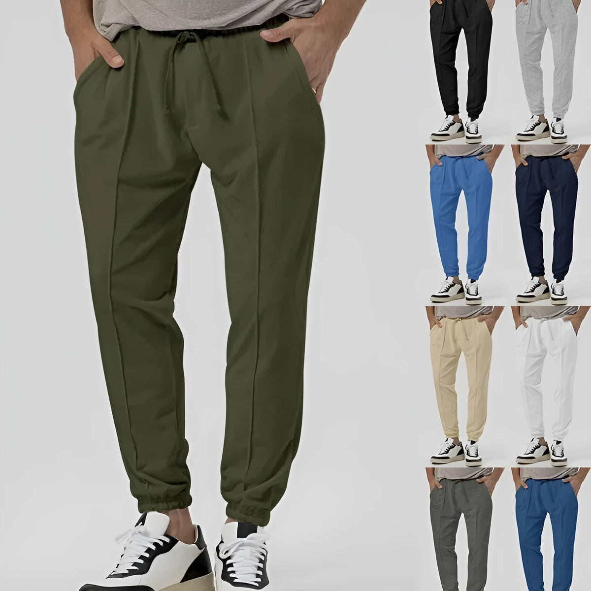 Men's gray cotton blend track sweatpants with loose tapered fit and straight-leg style
