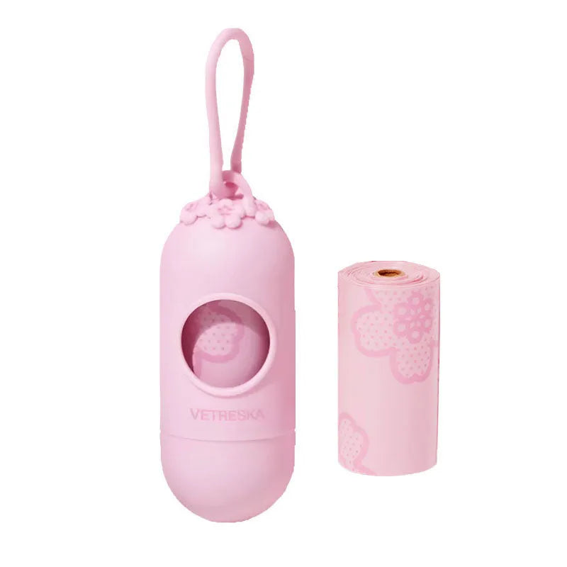 Portable dog poo bag dispenser capsule with scented inner bags in strawberry, orange, or cherry blossom options