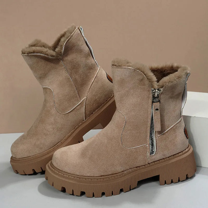 Women's black high-top plush snow boots with a side zipper and thick rubber sole