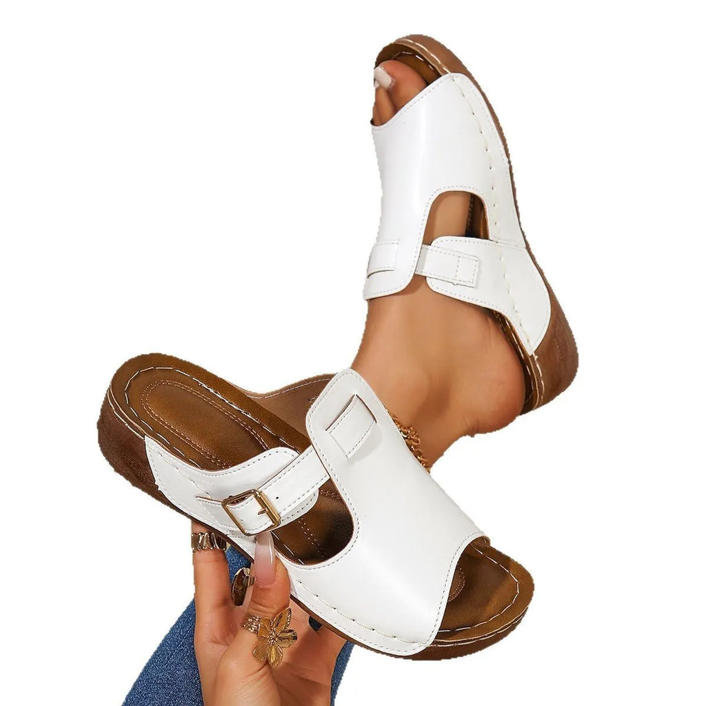 Women's white PU Roman-style magic stick slippers with a fish mouth toe opening on a light background.