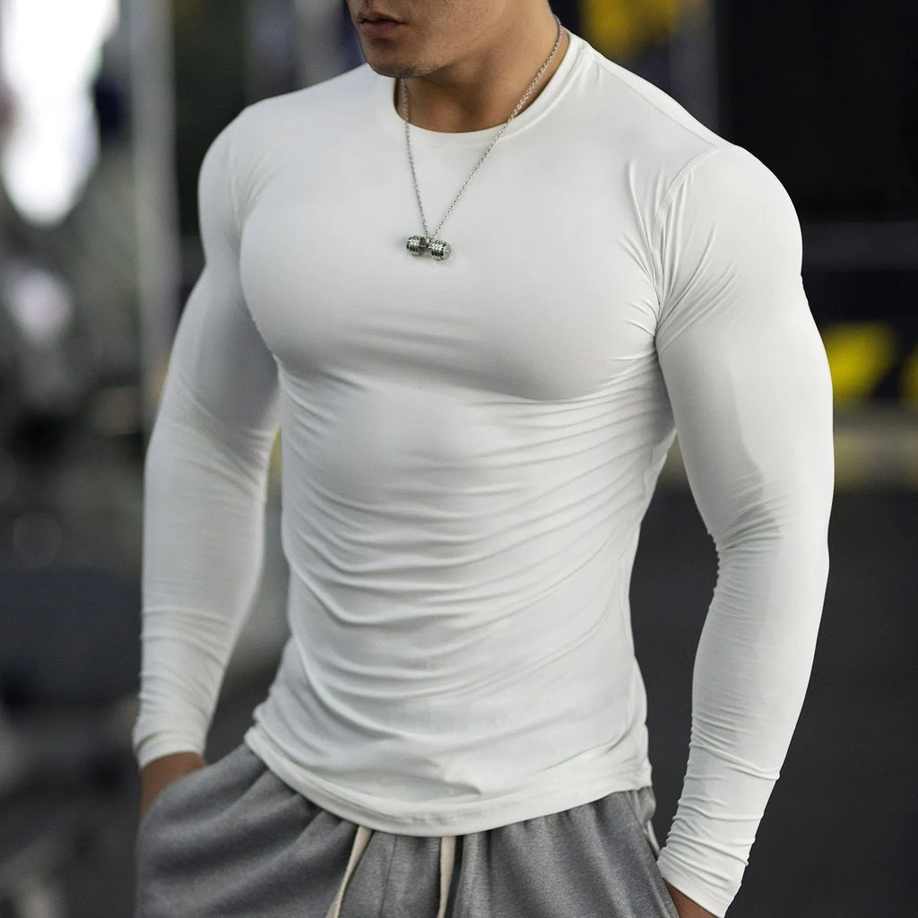 Men's long sleeve black fitness tights with slim fit for running and gym workouts