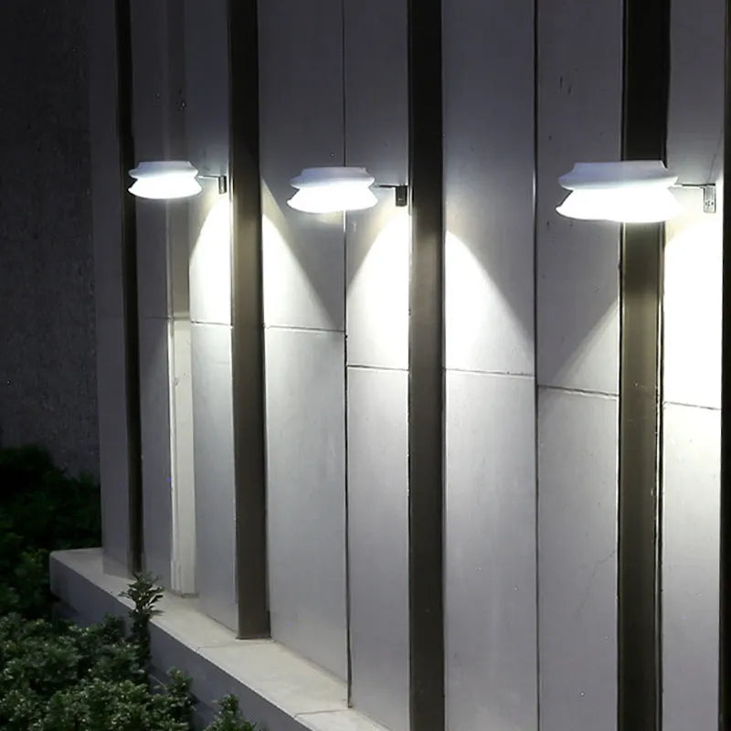 Solar-powered outdoor fence wall lamp for garden and patio illumination