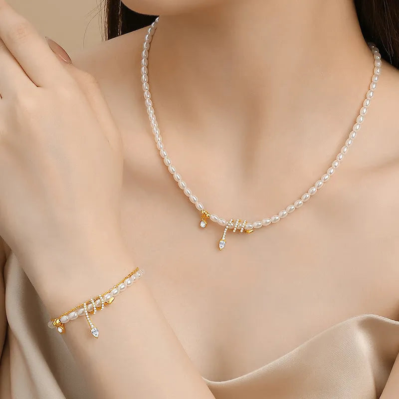 Pearl snake bracelet in 925 silver with geometric beaded design and electroplated gold finish