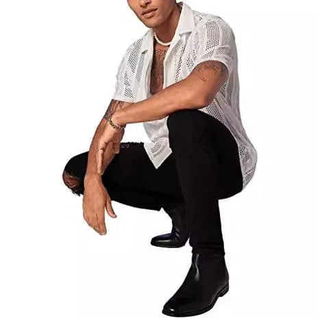 Man wearing a black jacquard knitted short-sleeve button shirt in a cardigan style