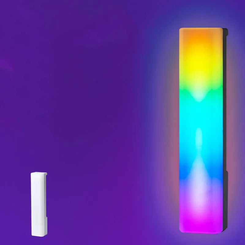 3D RGB music rhythm ambiance lamp in black or white shell on a tabletop.